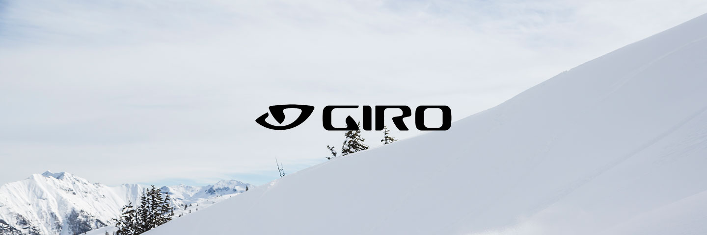 Giro logo with snow covered slope behind