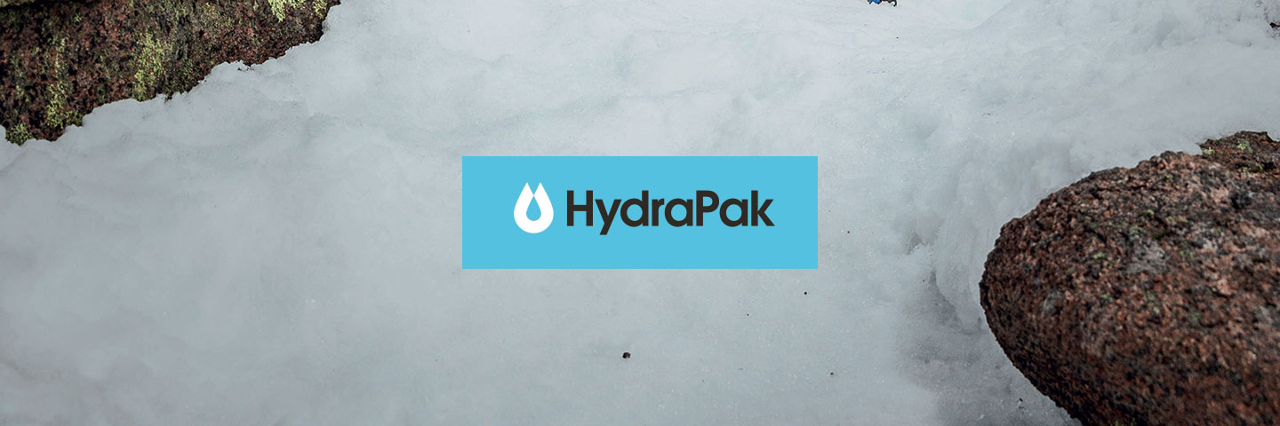 HydraPak logo with snow and rocks in the background