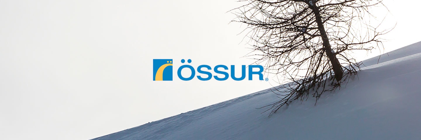 Ossur logo with snowy hillside in background