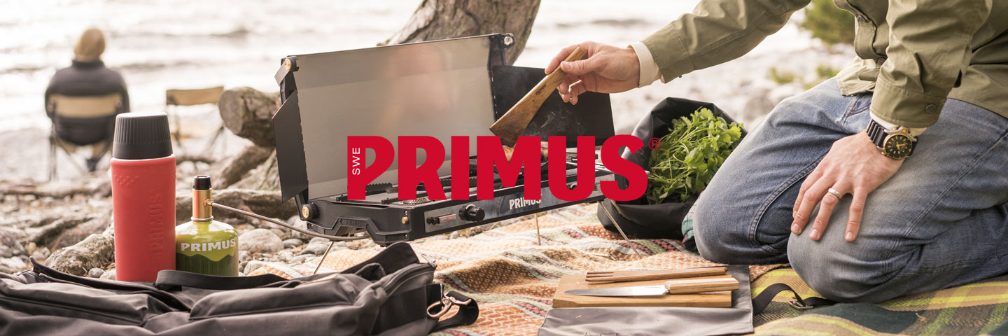 Primus logo with a lake scene behind