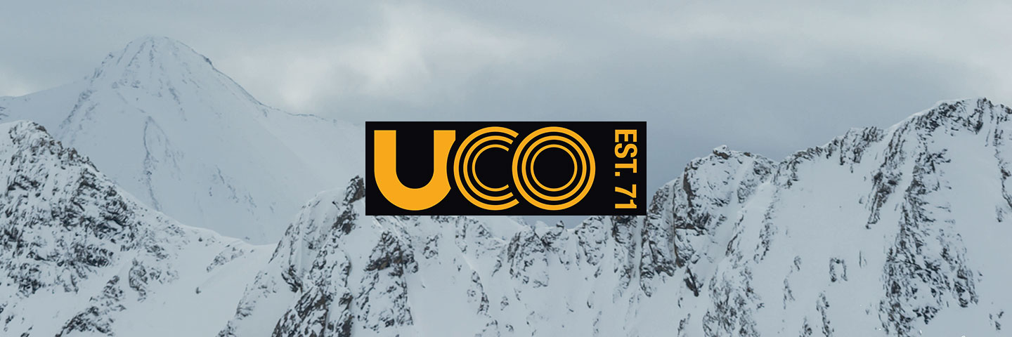 UCO logo with snowy mountain tops in background