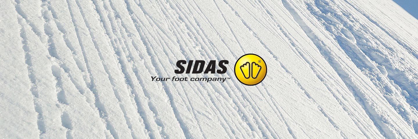 Sidas logo with ski tracked snow in background