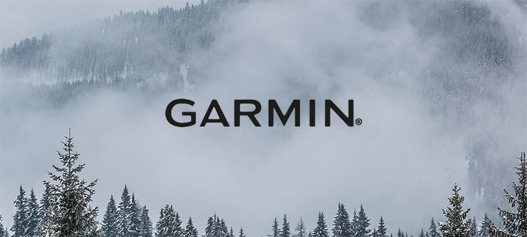 Garmin logo with misty forest scene in the background