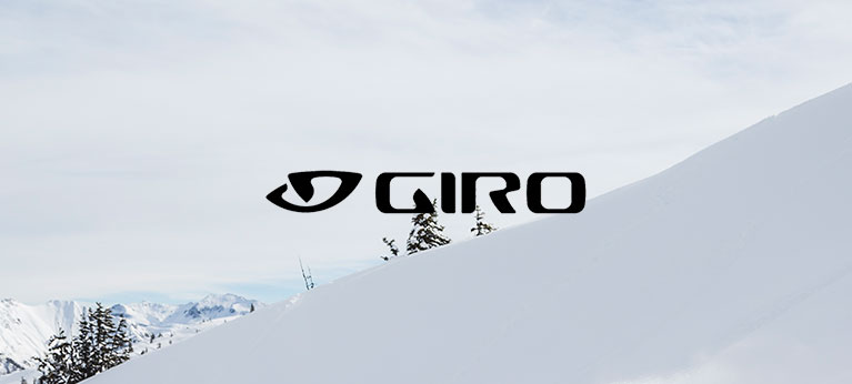 Giro logo with snow covered slope behind