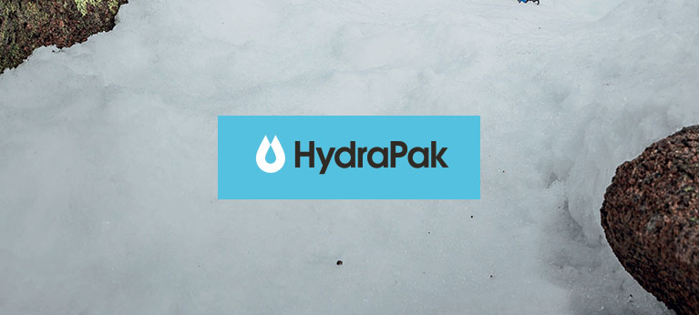 HydraPak logo with snow and rocks in the background