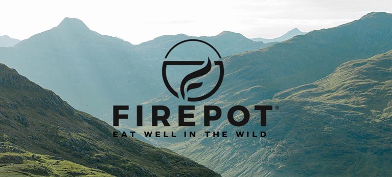 Firepot logo in front of some Scottish mountains