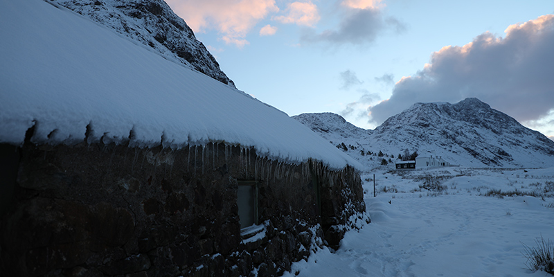 Bothy under fresh snow in the Scottish Highlands
