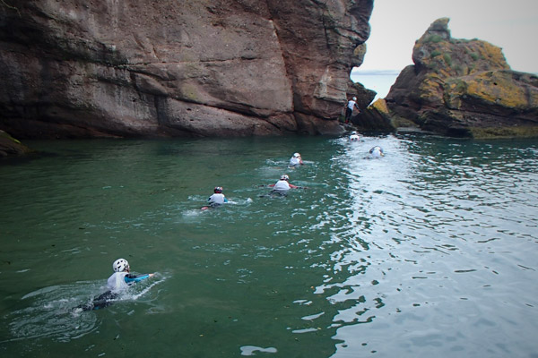 Adventure racers having a paddle