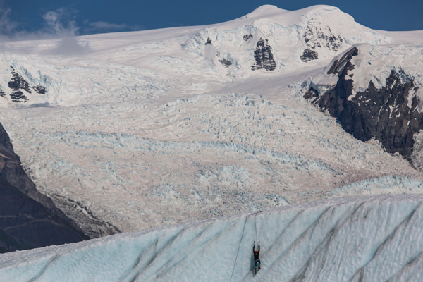 person ice climbing on root glacier