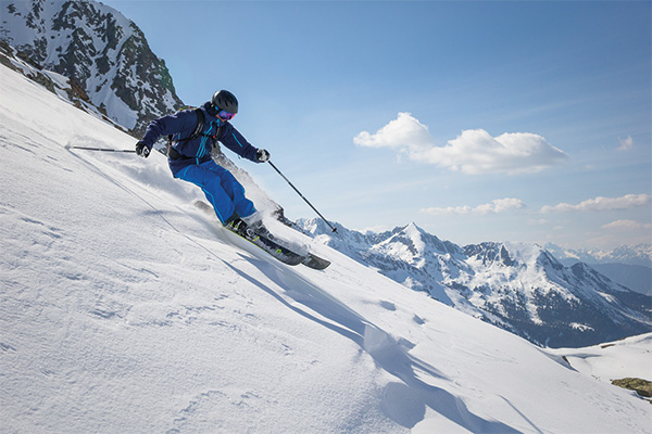 a skier travelling down a slope