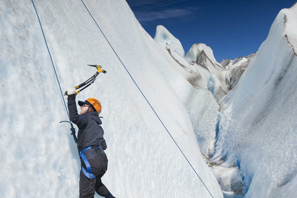 person ice climbing on viedma glacier